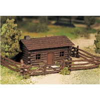 Log Cabin with Rustic Fence